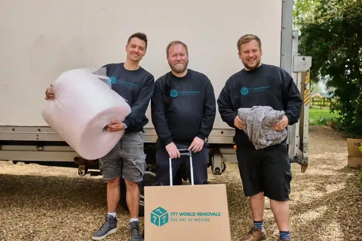 The 777 World Removals crew with bubble wrap and moving boxes ready for a Kiama move